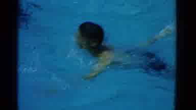 Yonkers New York (1953): Boy Swims Laps In Pool On A Bright Sunny Day
