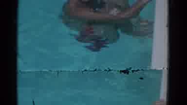 Yonkers New York (1953): Man Inside Pool With Knees Up Hanging On To Side And