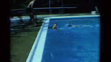 Yonkers New York (1953): Two Young Boys Racing In The Public Swimming Pool While