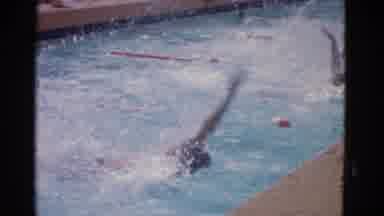 Yonkers New York (1953): Young Men Performing Backstroke During Swim Meet Or