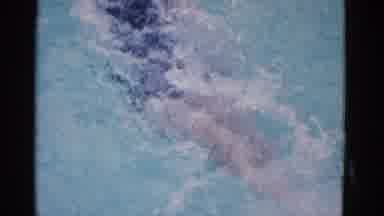 Yonkers New York (1953): Slow Motion Of Woman In Dark Bathing Suit And White Cap