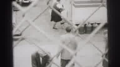 Le Mans France (1954): Supplies Being Moved From Trailers By Workers In The 1940'S