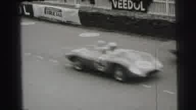 Le Mans France (1954): Crowds Watching Race Cars Drive By On A Clear Day