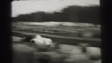 Le Mans France (1954): Spectators In Crowd Watching Car Racing Event Race Car Goes