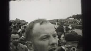 Le Mans France (1954): Packed Stands Of Spectators Watch As Race Cars Speed Past