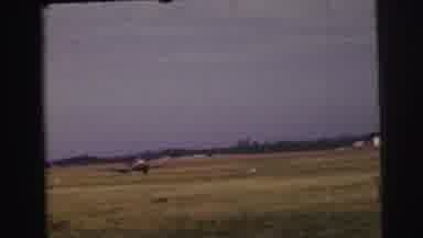 Le Mans France (1954): Airplane Coasting Down Runway Preparing To Take Off