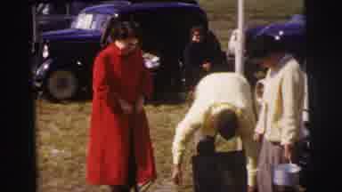 Le Mans France (1954): Man And Women Pumping Car Tires