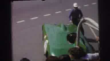 Le Mans France (1954): Car Racer Running To And Jumping In A Green Race Car