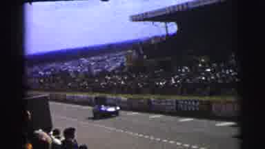 Le Mans France (1954): Racing Cars In A Racing Tracks With People Watching
