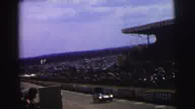 Le Mans France (1954): Racing Cars In The Race Track With Crowded Audience Of