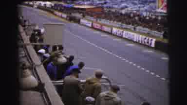 Le Mans France (1954): White Race Car Marked 25 With Black Stripes Pulls Up
