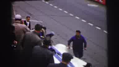 Le Mans France (1954): Race Car Stop At The Pit Stop And Many Mechanics Run