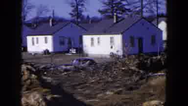 Hicksville New York (1954): Small White Homes In The Background Of Dirt Mound Lot