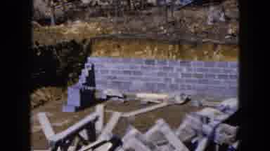 Hicksville New York (1954): A Scene Of A Brick Wall And Large Dirt Piles