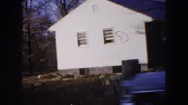 Hicksville New York (1954): Two Automobiles Rapidly Driving Past A Pair Of Single