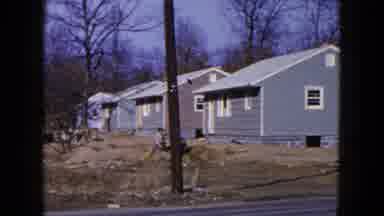Hicksville New York (1954): Camera Pans Across The Blue Houses That Are Nestled