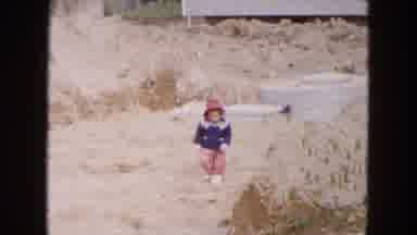 Hicksville New York (1954): A Little Child Walking In The Sand With Cute Smile It