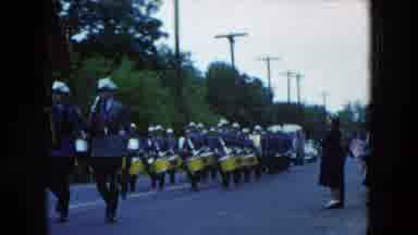 Hicksville New York (1954): Parade Has Old Time Cars And People Marching In A