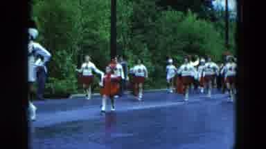 Hicksville New York (1954): High School Marching Band In A Parade On A Rainy