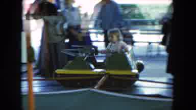 Hicksville New York (1954): Child Rides Green Toy Tank People Riding Roller