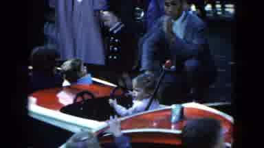Hicksville New York (1954): Children Riding In Circles On Amusement Park Boat Ride