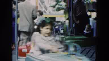Hicksville New York (1954): Children In Colorful Amusement Park Cars Circle On