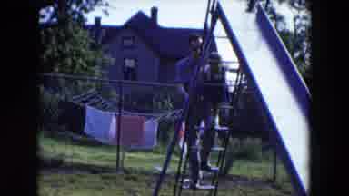 Hicksville New York (1954): Dad Keeps His Baby Playing Near The House