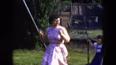 Hicksville New York (1954): Woman Plays With Child In Park Toy On Beautiful Sunny