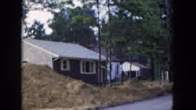 Hicksville New York (1954): View Of Brown House With Small Child Getting Out Of