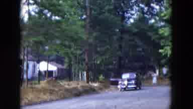 Hicksville New York (1954): Little Girl Wearing Blue Dress Gets Out Of Black Car