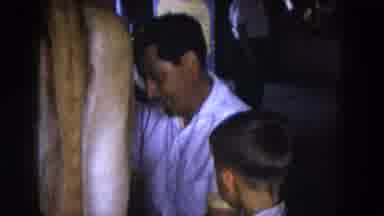 Hicksville New York (1954): The Father Is Holding His Baby In His Arms And