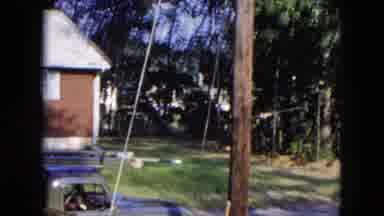 Hicksville New York (1954): Man Working On Telephone Pole On A Sunny Day