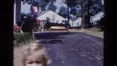 Hicksville New York (1954): Mom And Child In Backyard Taking Care Of Household