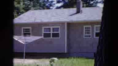Hicksville New York (1954): Small House With A Young Child Walking Through A