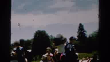 California USA (1954): Lively Family Arriving To Practice Leisure Next To A