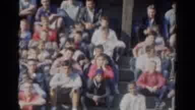 California USA (1954): People Sitting In Stadium Seats On A Bright Sunny Day
