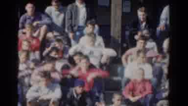 California USA (1954): Stands Full Of Young Boys And Girls As They Watch A Game In
