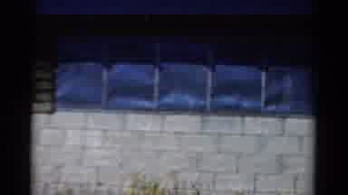 California USA (1954): Video Of Windows Placed Above White Brick Wall Behind