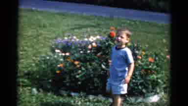 California USA (1954): Boy Playing In Yard