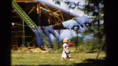 California USA (1954): The Three Childrens Are Walking In The Garden And Talking