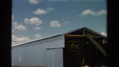 California USA (1954): Rural Farmland Dilapidated Metalworking Barn In Daylight