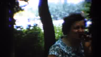 California USA (1954): Picnic People Playing With A Beach Ball While One Woman