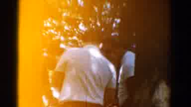 California USA (1954): Men Trees Sunny Woods Moving Picnic Gathering Forest