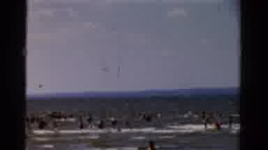 Panama City Beach Florida (1954): People Walking In The Water At The Beach On A
