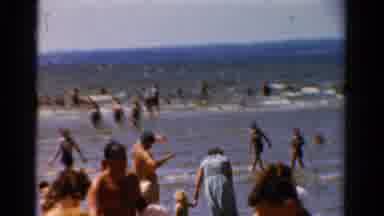 Panama City Beach Florida (1954): Families On A Crowded Sand Beach Swimming In The