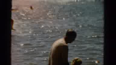 Panama City Beach Florida (1954): Father And Child Splashing Around In The Water