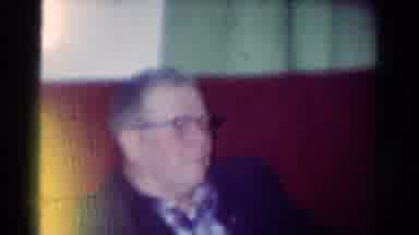 Toledo Ohio USA (1954): An Older Man Leaning Forward Then A Younger Man Thinking