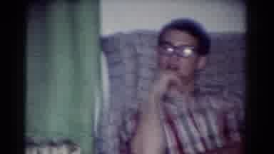 Toledo Ohio USA (1954): Young Boys Sitting On Patterned Couch Near Long Green