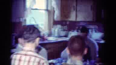 Toledo Ohio USA (1954): People Gathered Around Table In Kitchen With Windows