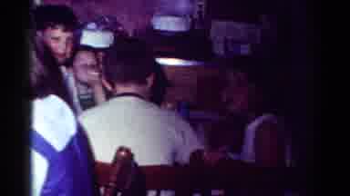 Toledo Ohio USA (1954): Small Boy Makes Face At The Table Older Woman Sees And